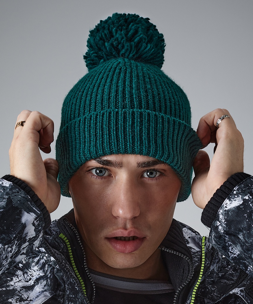 Engineered knit ribbed pom pom beanie